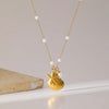 SearchFindOrder Gold Seashell Charm Necklace