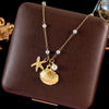 SearchFindOrder Gold Seashell Charm Necklace