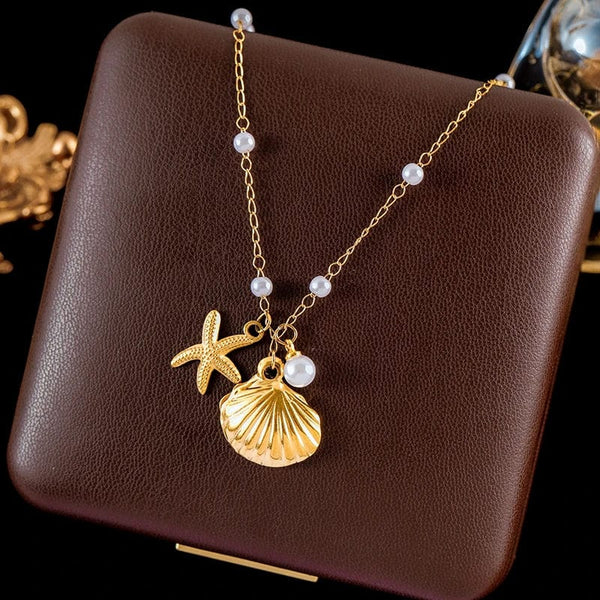 SearchFindOrder Gold Seashell Charm Necklace